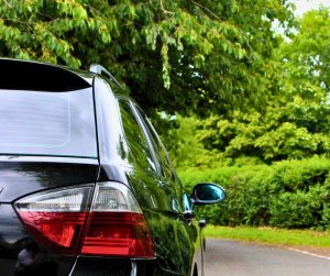 Back right hand-side shot of a black BMW taken by Flight and Flora